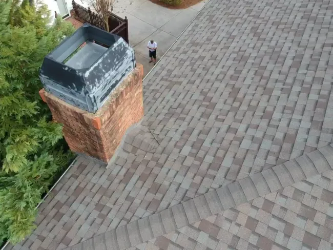 We replaced the chimney flashing and drip edge for our customers. They didn't need the full roof replacement so we helped them get protection and security by repairing and reinforcing leak prone areas .