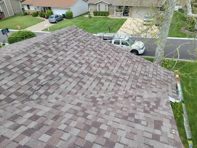 After a thorough inspection in St. Charles, we confirmed no hail damage, preserving the roof's integrity for years to come.