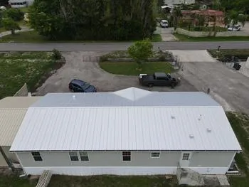Shingle To Metal Roof Replacement