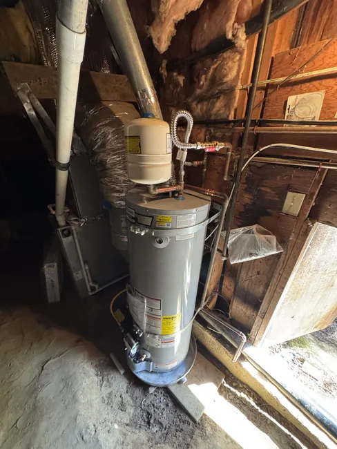 We replaced an old 50-gallon natural gas water heater, ensuring efficient performance for reliable hot water access.