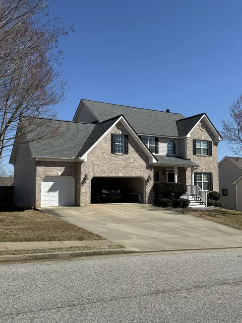 When leaks appeared, we replaced the roof with Owens Corning Duration shingles in Estate Gray, enhancing both durability and curb appeal for this residential home.
