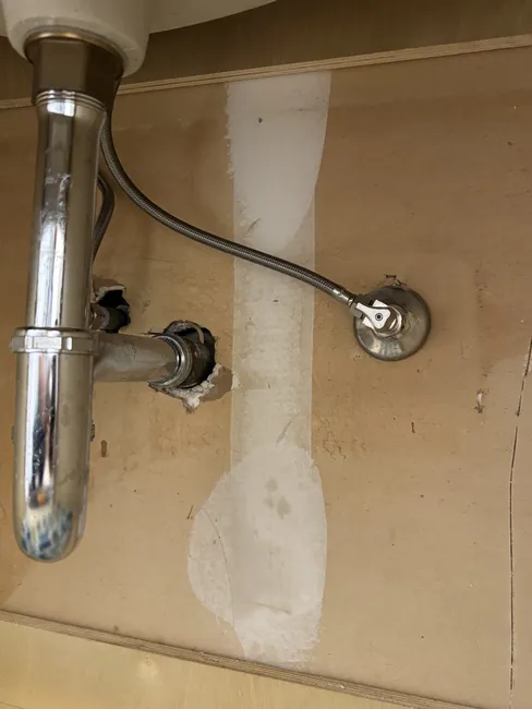 Drain Cleaning And Faucet Adjustment