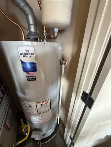 photo at Owasso, OK on Jul 13, 2026: A water heater replacement was needed to improve the home's efficiency. We removed the old unit and photo at Owasso, OK on Jul 13, 2026: A water heater replacement was needed to improve the home's efficiency. We removed the old unit and