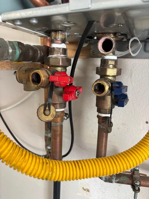 We optimized a tankless water heater through thorough maintenance, ensuring reliable hot water and boosted efficiency for this residential home.