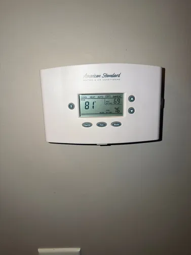 Thermostat photographed during a Birmingham cooling service visit