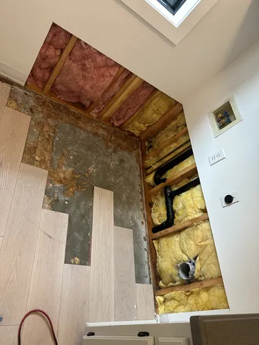 photo at Wichita, KS on Sep 15, 2026: A specific area in the basement required the removal of building material as indicated in the AMEI 