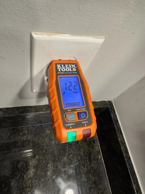 Restored power to guest and master bathrooms by replacing a non-functional GFCI outlet in the garage.
