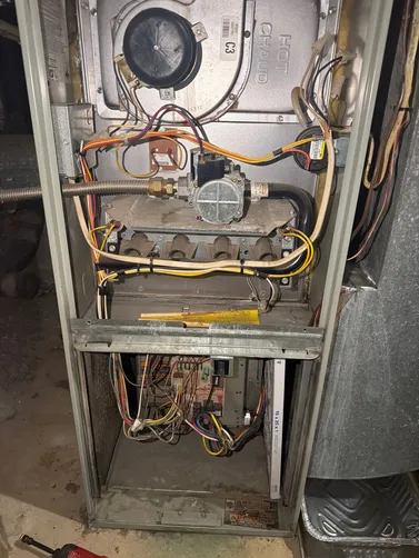 Indoor HVAC equipment photographed during a Hoover garage water-leak service visit