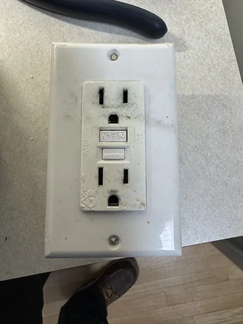 The GFCI outlet in the kitchen has been replaced due to frequent nuisance tripping and its limited functionality.