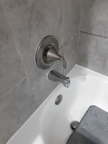 photo at Humble, TX on Dec 09, 2025: The single handle shower faucet in the guest bathroom was leaking and not functioning properly. We 