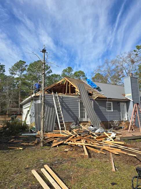 After a tree struck this home, we restored the space, ensuring it was safe and beautiful once again.