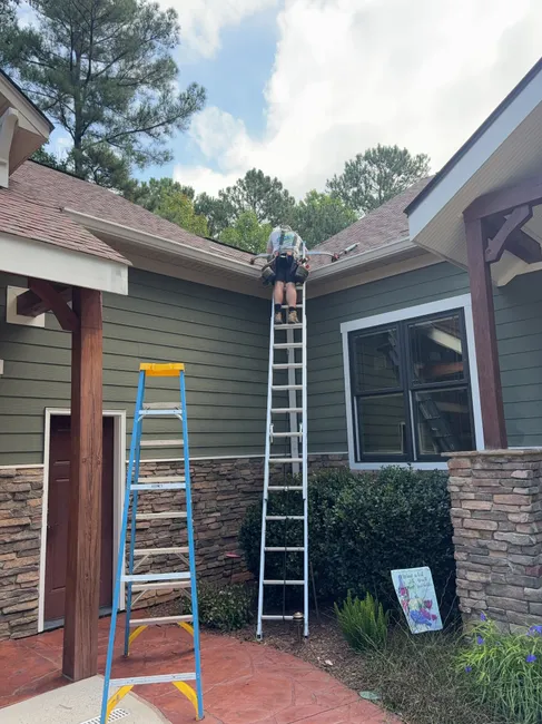 New 6-inch seamless gutters and Grizzly Gutter Guards were installed, enhancing drainage and protecting the home from water damage.