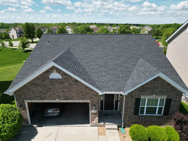 A thorough roof replacement in Lake St. Louis enhanced the home's value with durable GAF Timberline HDZ shingles.