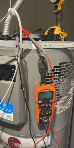 photo at Conroe, TX on Dec 01, 2025: The water heater was not operating due to a lack of a 240-volt supply to the fuse box. We recommend