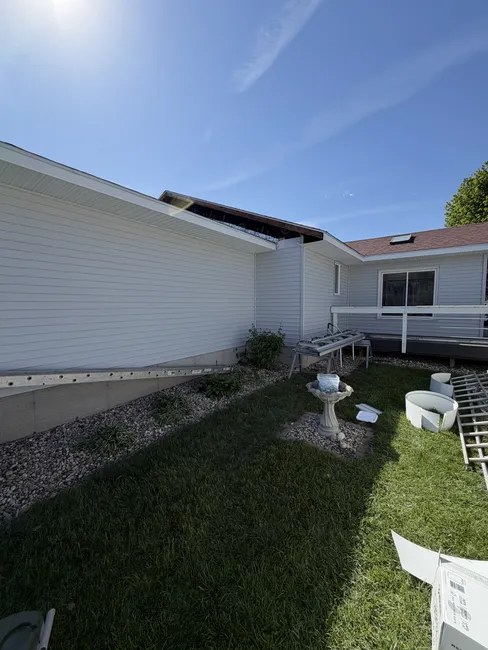 A home in need of a refresh received new siding, updated soffit, and custom composite steps for better access.