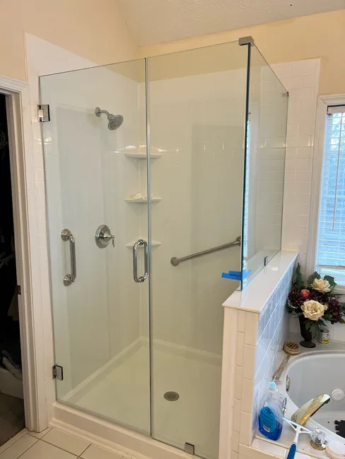 This is a new 3-panel glass shower door we installed for this happy customer in McDonough. We carry the largest selection of glass products for your home. Call today for our full list of glass services!
Our glass experts are passionate about the glass replacement work that we perform for our clients. We offer free estimates and same-day services. With 10+ years of experience and hundreds of happy customers, we install all forms of glass and have earned the reputation of being a trusted & reliable Metro-Atlanta glass company.
S & B Glass & Windows
190 Promenade Parkway,
Fayetteville, GA 30214.
We design, create and install all types of glass products in the Fayetteville, Peachtree City, Newnan and surrounding Metro Atlanta Area.