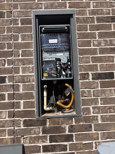 photo at Atascocita, TX on Sep 08, 2025: The ignitor coil was malfunctioning, which disrupted the tankless water heater's operation. We repl