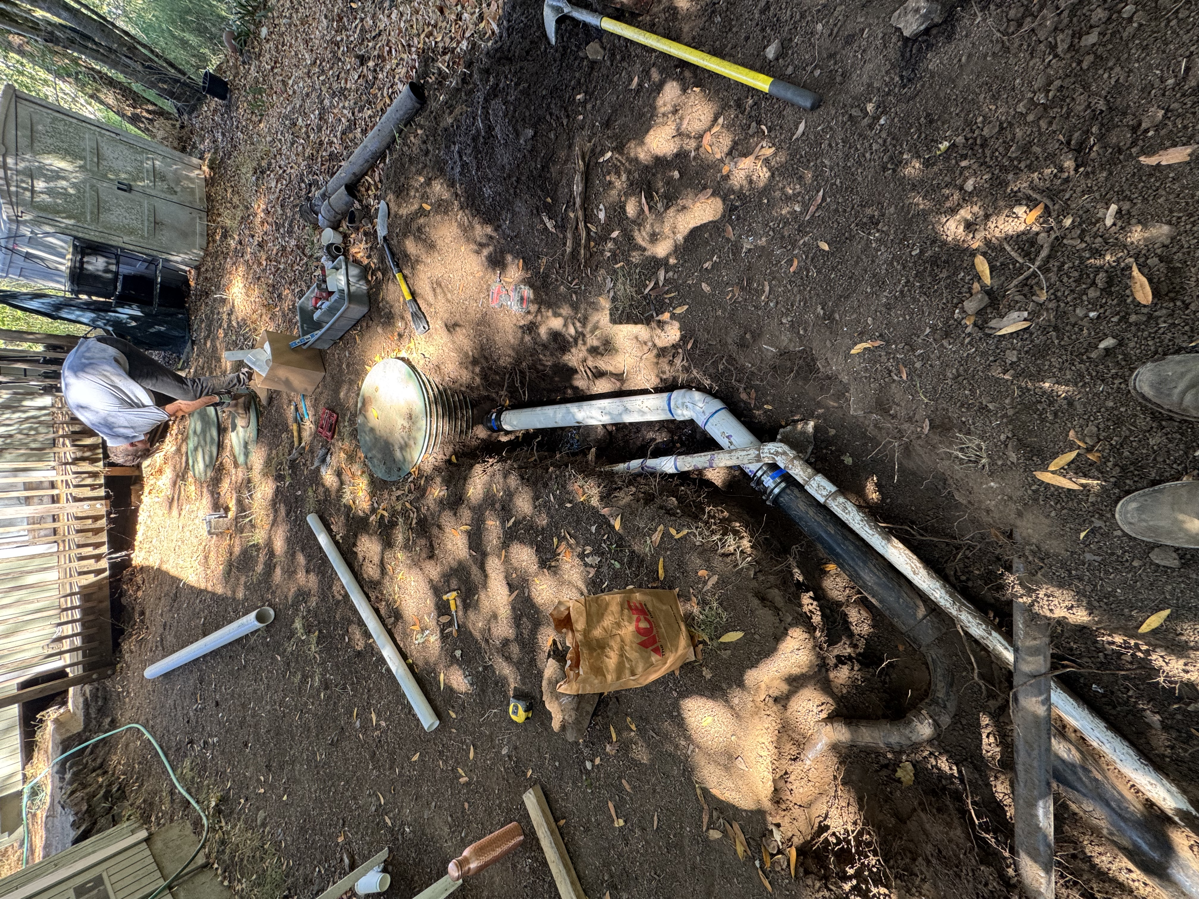 Section of 4 inch sewer lateral dug up and replaced after root damage in Woodacre