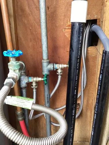 photo at Kerrville, TX on Feb 21, 2026: A leaking hot side valve next to the water heater resulted in water being shut off to the home. We photo at Kerrville, TX on Feb 21, 2026: A leaking hot side valve next to the water heater resulted in water being shut off to the home. We