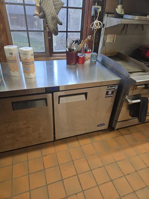 Upon inspecting the walk-in cooler, we replaced malfunctioning fan motors and cleaned the coils for optimal performance. Three reach-in coolers were also assessed, with essential repairs recommended to enhance efficiency.