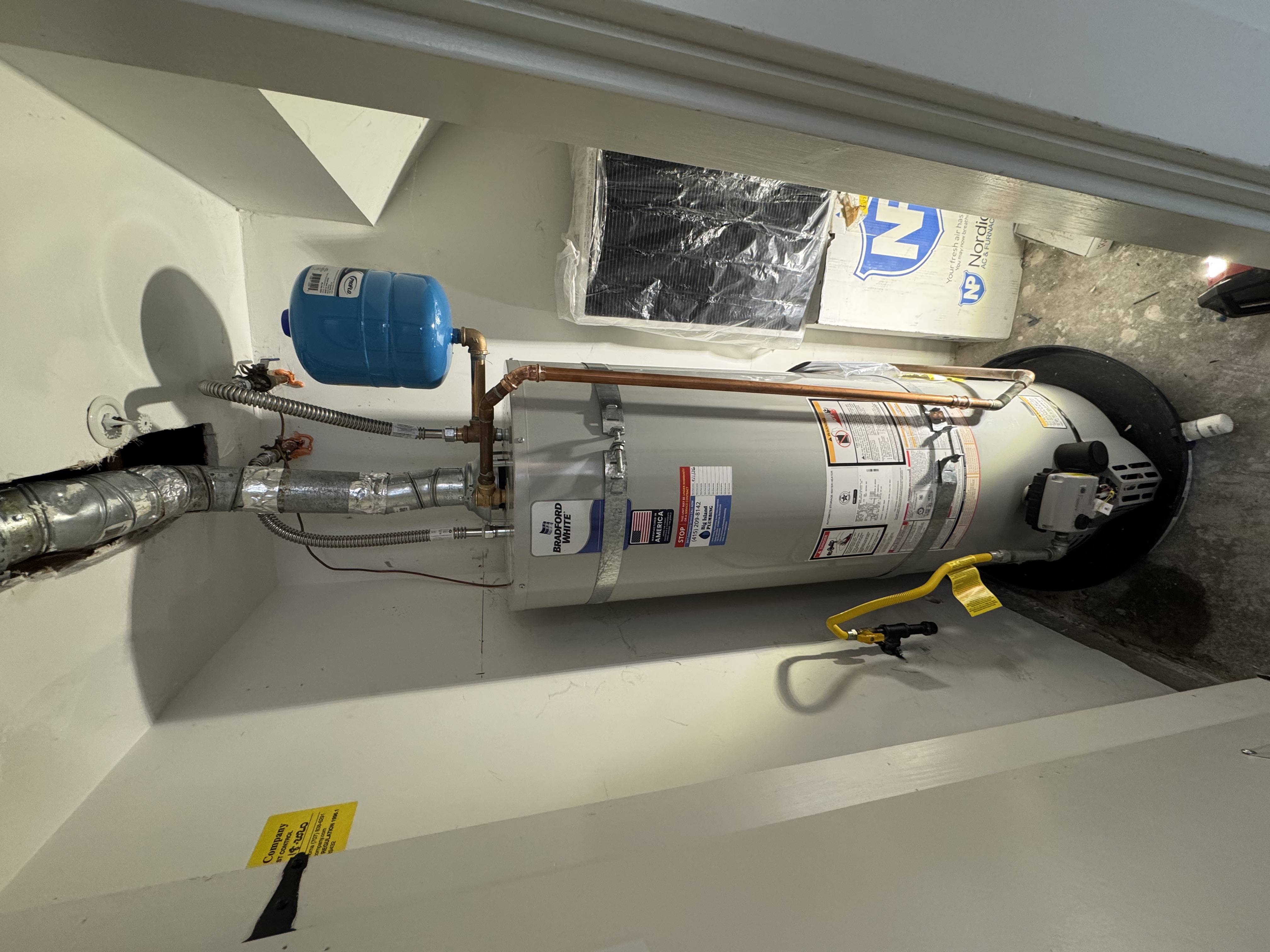 New 50 gallon water heater with earthquake straps, shutoff valves and expansion tank installed by Big Island Plumbing in San Anselmo