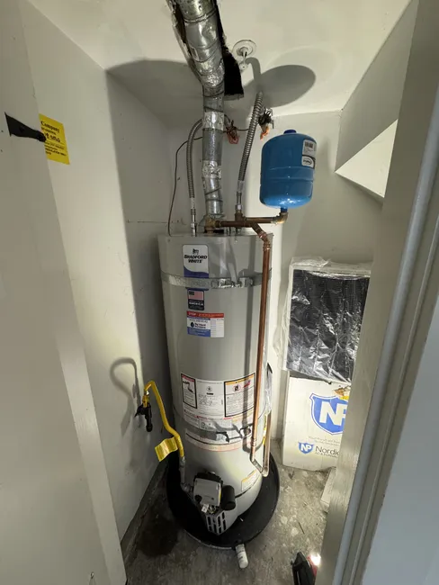 The old water heater was replaced with a new unit, complete with safety upgrades for optimal performance.