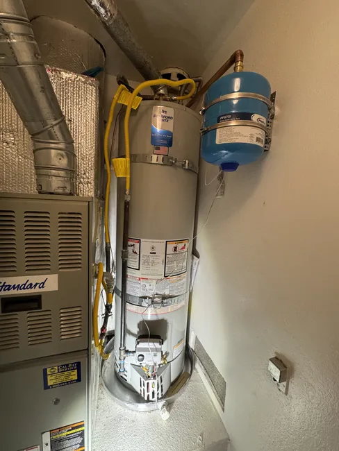 An outdated water heater was replaced with a modern unit, ensuring safety and efficiency for the home.