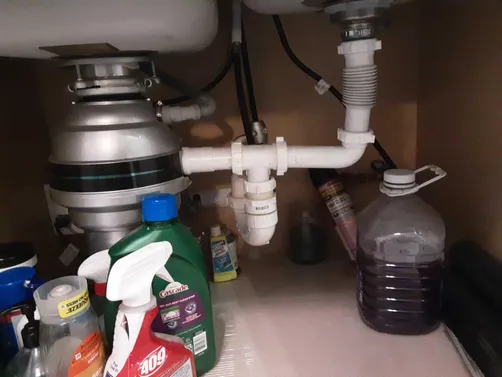 photo at Houston, TX on Dec 29, 2025: When confronted with a clogged drain pipe, we disconnected the plastic P-trap and utilized a small 