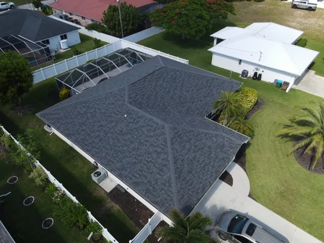 The old roof was removed and replaced with durable shingles, enhancing the home's energy efficiency and curb appeal.