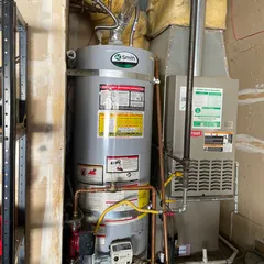 photo at Martinez, CA on Nov 27, 2025: A leaking water heater can lead to significant issues, so we replaced the old unit with a new Rheem