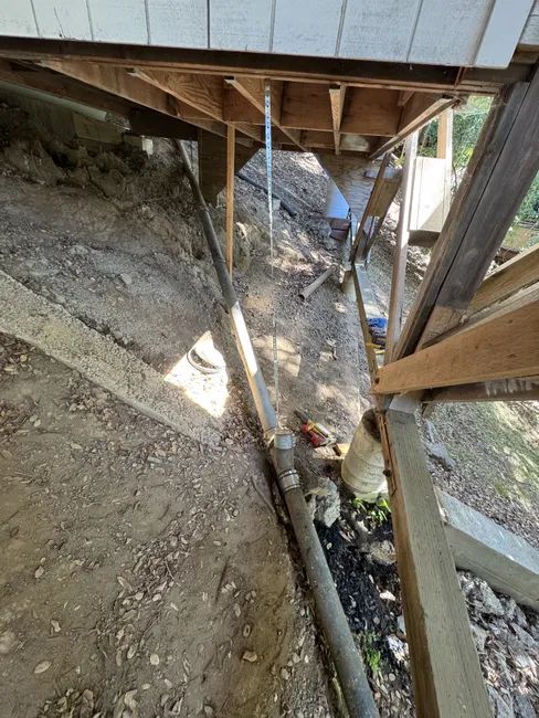 We replaced a worn 4” heavy-duty band and strap, restoring the cast iron pipe's performance and ensuring long-lasting plumbing integrity.
