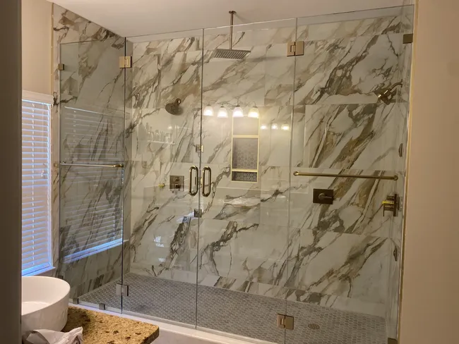 This new glass installation included a double door. We are the company Jonesboro customers trust with their home installations. Call for your quote and see why we're the perfect glass company for you!
Our glass experts are passionate about the glass replacement work that we perform for our clients. We offer free estimates and same-day services. With 10+ years of experience and hundreds of happy customers, we install all forms of glass and have earned the reputation of being a trusted & reliable Metro-Atlanta glass company.
S & B Glass & Windows
190 Promenade Parkway,
Fayetteville, GA 30214.
We design, create and install all types of glass products in the Fayetteville, Peachtree City, Newnan and surrounding Metro Atlanta Area.