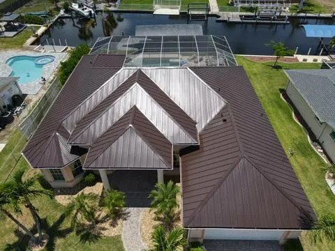 Concrete Tile To 24 Ga ZAM Standing Seam Metal