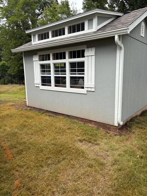 Completed a seamless gutter installation on the shed, enhancing functionality and protecting against water damage.