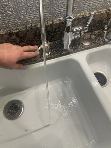 photo at Martinez, CA on Apr 10, 2026: The bathroom sink faucet was leaking and required repair. We successfully descaled the tankless wat