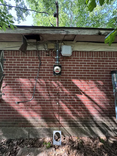 After a fallen limb damaged the service line, we repaired the riser and meter can, ensuring stability and safety for the home.