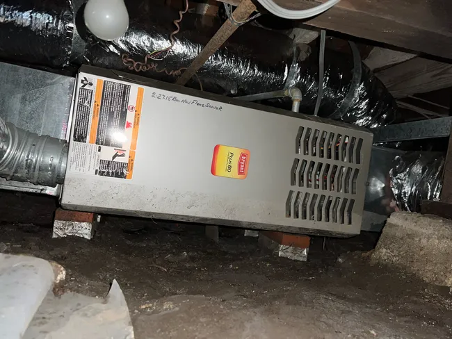 Inspected a furnace for water damage after a storm. Advised client to contact insurance.