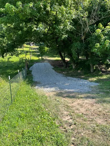 photo at Portland, TN on Jun 04, 2026: To improve drainage in the area, we installed an 18”x20’ plastic culvert and cleared the creek bed photo at Portland, TN on Jun 04, 2026: To improve drainage in the area, we installed an 18”x20’ plastic culvert and cleared the creek bed
