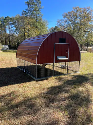 photo at Kennard, TX on Dec 15, 2025: 10x12 chicken coop in rustic redMade with an all welded steel frame, solid loft area with roosting
