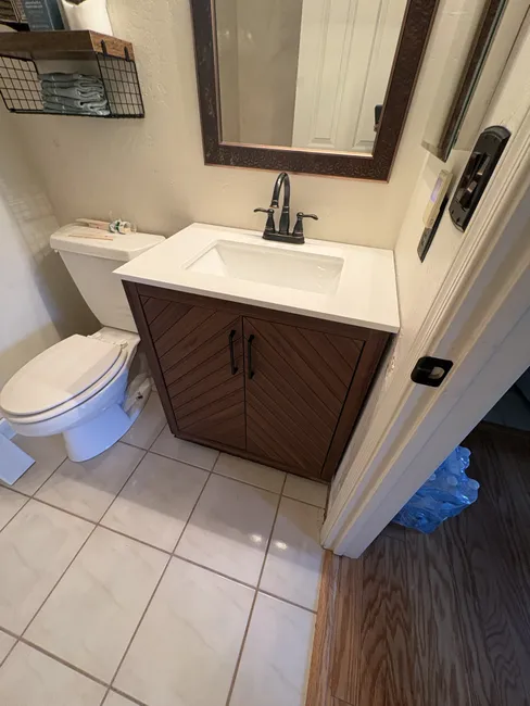 Installed new shower trims and cartridges for both bathrooms, enhancing style and functionality effortlessly.