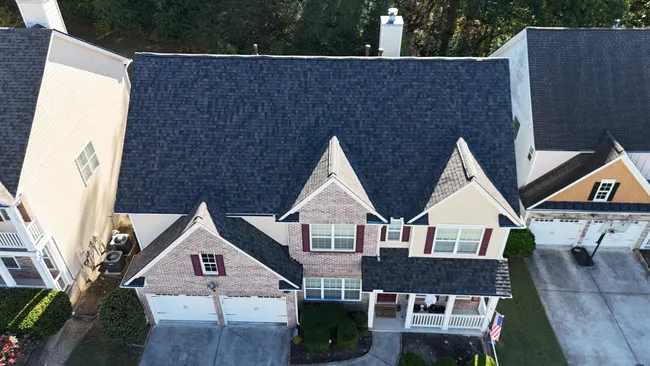 After assessing wear, we replaced Geo's roof with Owens Corning Duration shingles in Peppercorn, enhancing durability and curb appeal.