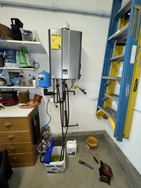 Accumulated sediment compromised the efficiency of this tankless water heater. We performed a thorough descaling and flush while adjusting the thermoexpansion tank, ensuring optimal performance for the homeowner.