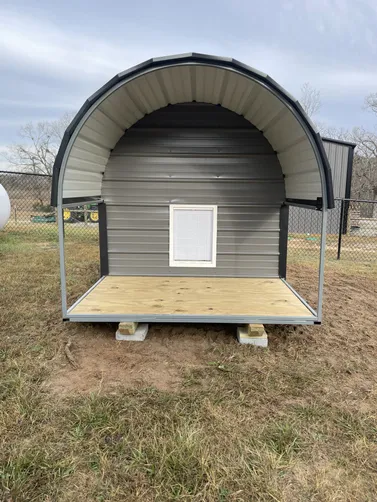 photo at Ore City, TX on Jan 09, 2026: 8x12 open animal shelter in charcoal with black trim 6x8 dog house(solid floor, enclosed back room