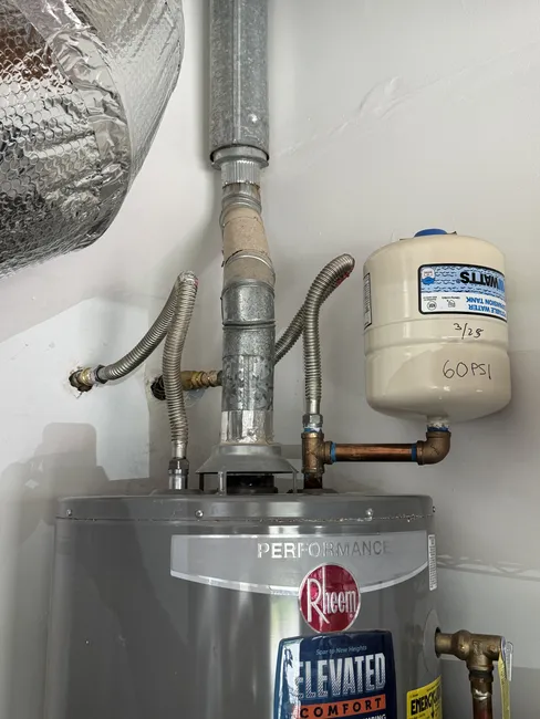 A faulty ball valve led to water supply issues, so we replaced it and installed a new Water Heater Flex Supply for improved flow and performance.