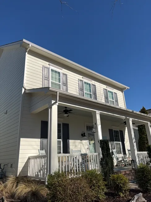 New 5-inch seamless gutters were installed at a Davidson residence, enhancing curb appeal and improving drainage.