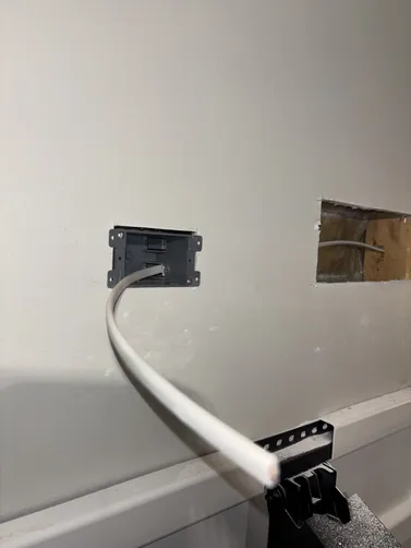 Installed a new duplex outlet above the fireplace for a TV!