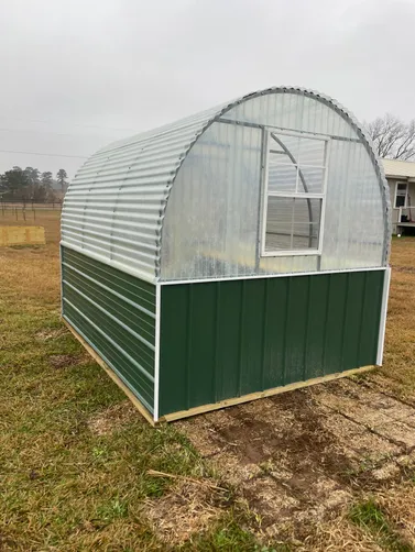 photo at Winona, TX on Jan 23, 2026: 8x10 Greenhouse with window, storm door, treated shelving, treated base20 year corrugated fibergla