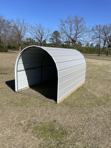 photo at Maud, TX on Jan 20, 2026: 6x10open front shelter with welded steel frame, 40 year max rib siding in -Pewter gray-treated 2x4