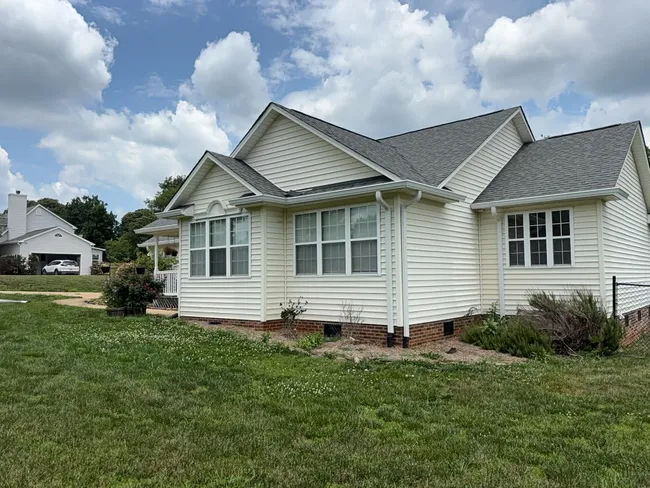 At a residential property in Mount Ulla, we upgraded the drainage system with new 6-inch seamless gutters and downspouts, ensuring effective water management and long-lasting durability.