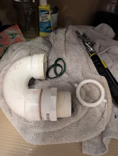 photo at Houston, TX on Dec 29, 2025: When confronted with a clogged drain pipe, we disconnected the plastic P-trap and utilized a small 